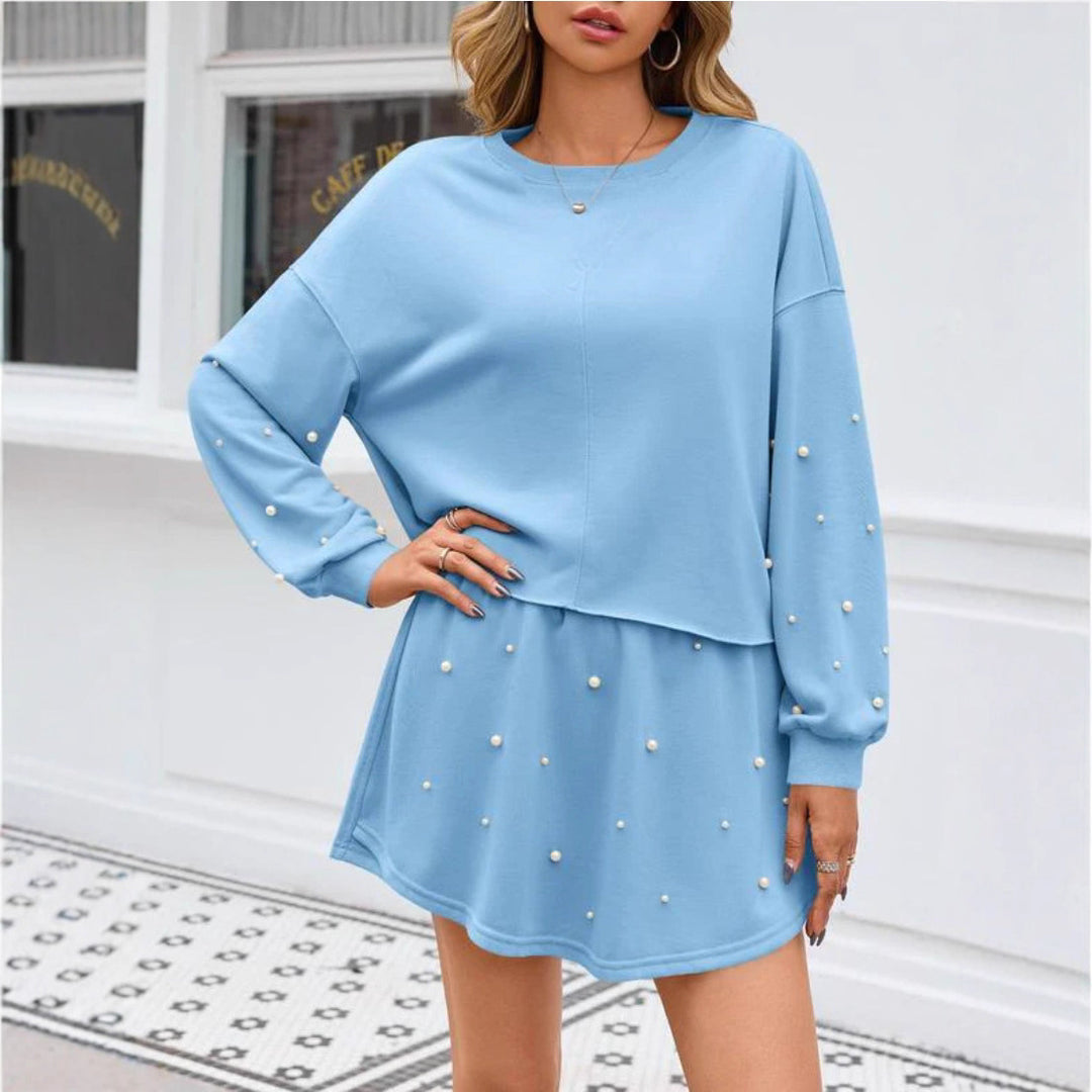 Kjole sweatshirt for kvinner med dimples og perleapplikasjoner Skjora