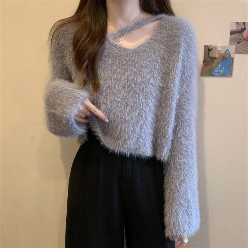 Kvinne Fluffy Genser med Casual Snitt og Dyp V-Hals Skjora