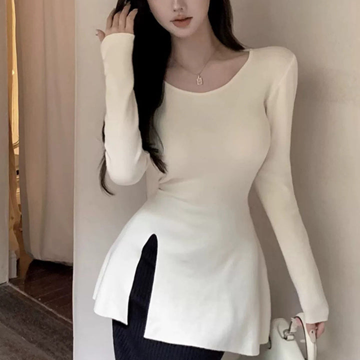 Kvinne langermet topp med asymmetrisk kutt og elegant detalj