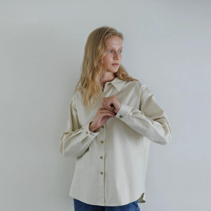 Damer Elegant og løs bluse med smal krage Skjora