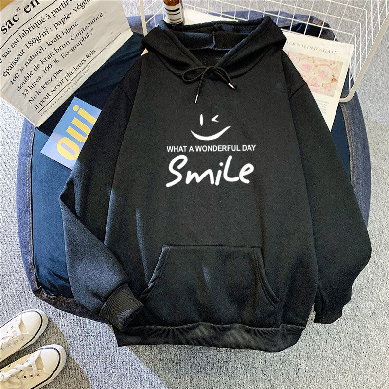 Dame hettegenser med gledelig smile-print Skjora