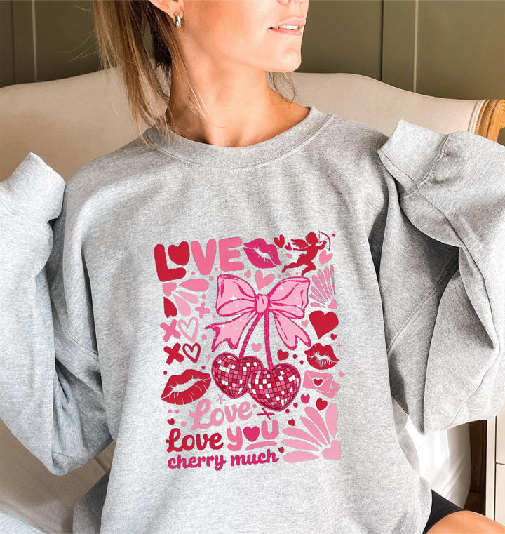 Dame sweatshirt med voluminøse ermer og lekent kirsebærmotif Skjora