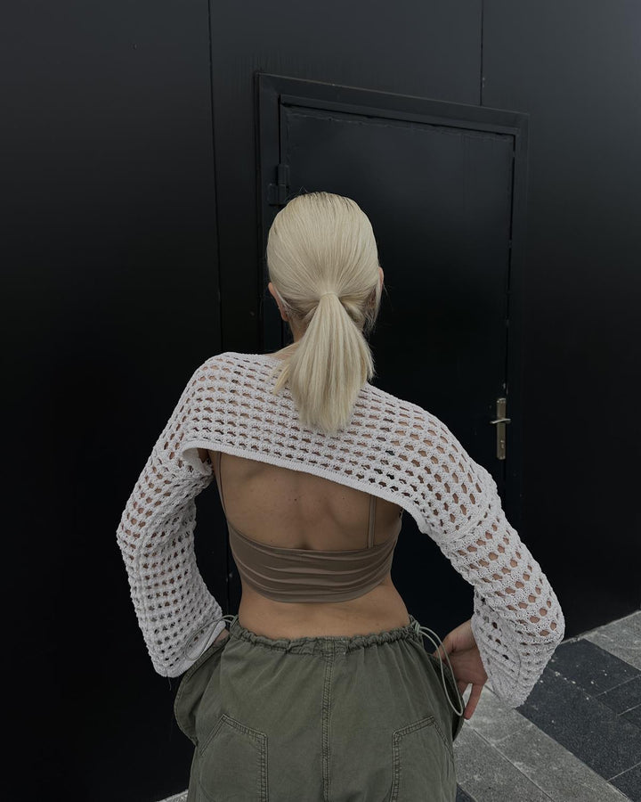 Dame heklet crop-top med elegant åpen design og lange ermer Skjora