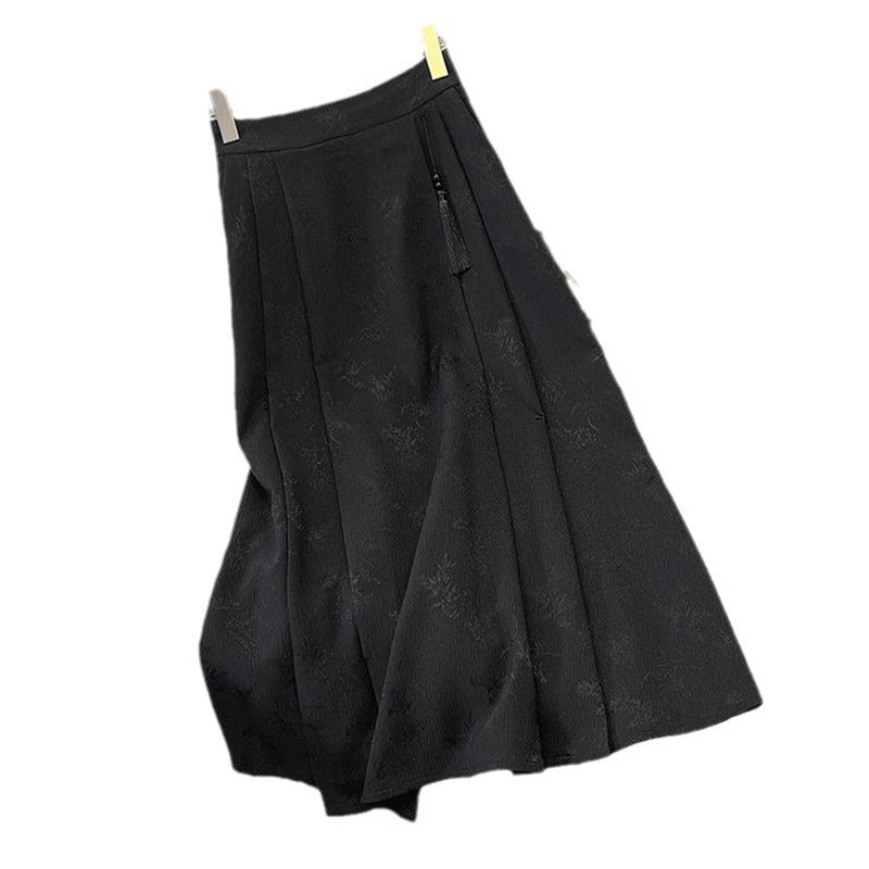 Damenes elegante midi skjørt med teksturert stoff og flytende snitt