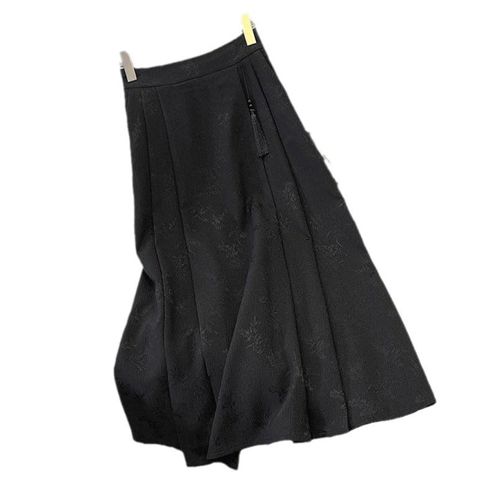 Damenes elegante midi skjørt med teksturert stoff og flytende snitt