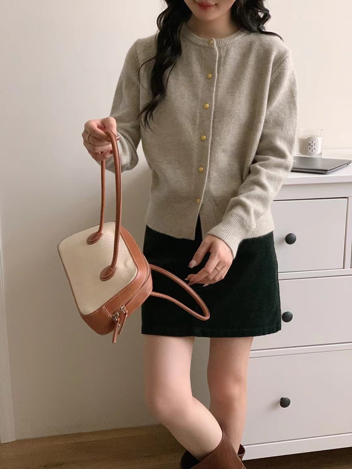 Kvinne cardigan med elegante knappdetaljer og mykt materiale Skjora