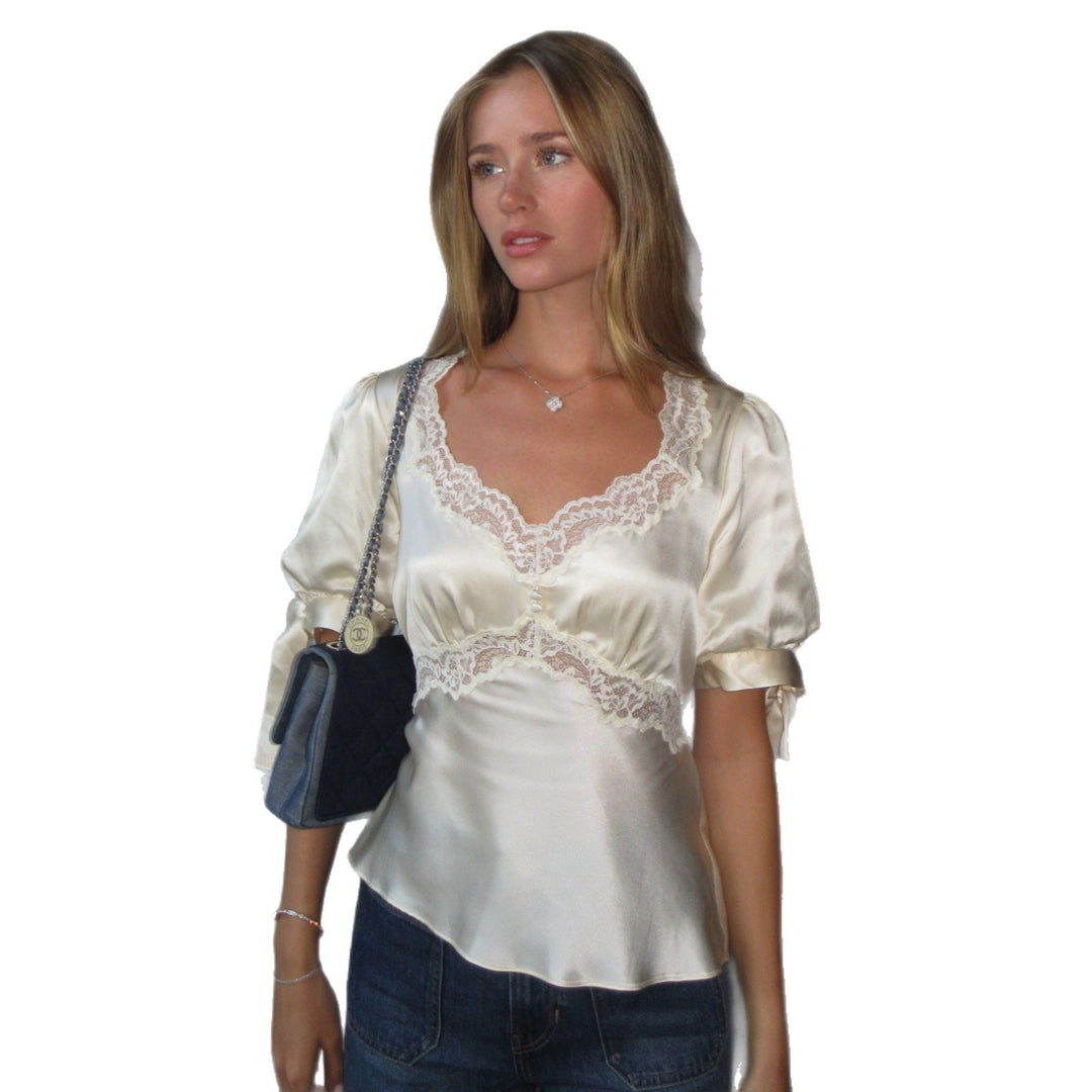 Ladies' satin blouse with pointed details Skjora