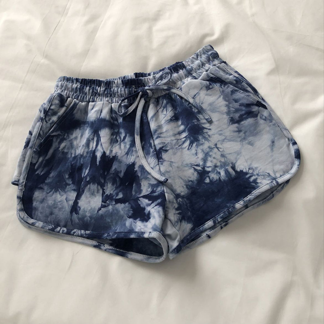 Kvinne casual sweatshorts med trendy tie-dye design og praktiske sidelommer
