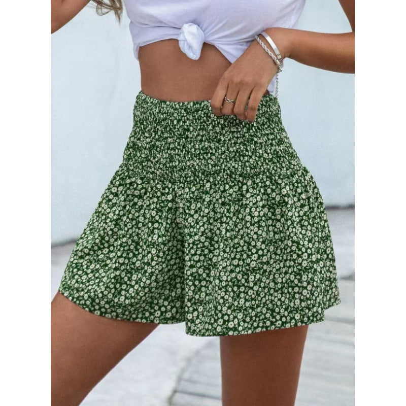 Dame shorts med elastisk midjebånd og blomsterdesign Skjora