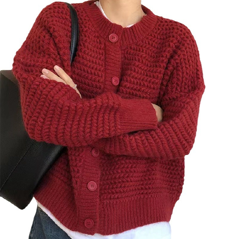 Kvinnes chunky strikket cardigan med dekorative knapper og avslappet snitt Skjora