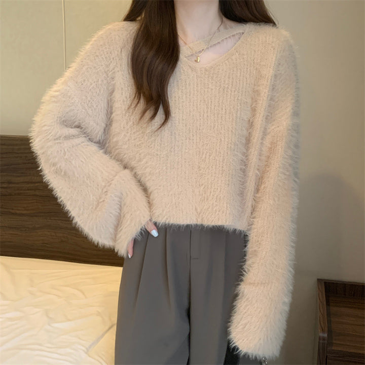 Kvinne Fluffy Genser med Casual Snitt og Dyp V-Hals Skjora
