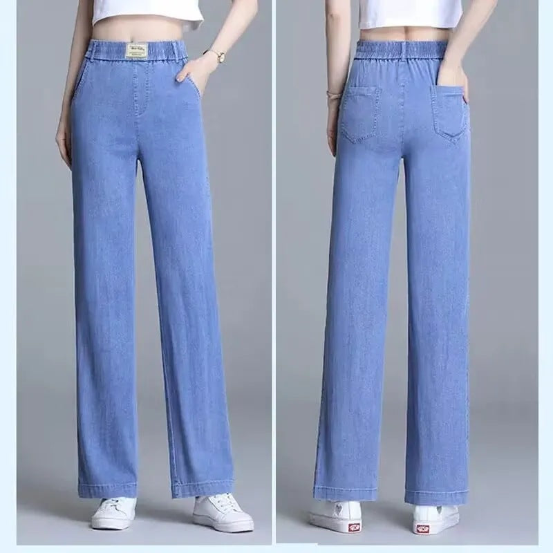 Kvinne Loose Jeans med Elastisk Liv og Praktiske Lommer Skjora