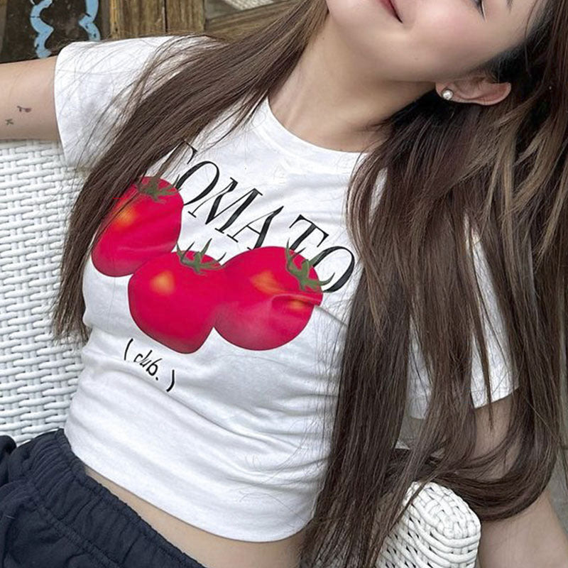 Dame cropped T-shirt med kreativt trykk og komfortabel rund halsutskjæring Skjora