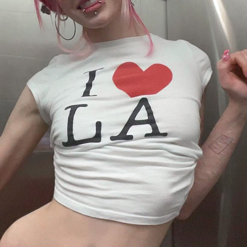Dame cropped T-shirt med kreativt trykk og komfortabel rund halsutskjæring Skjora