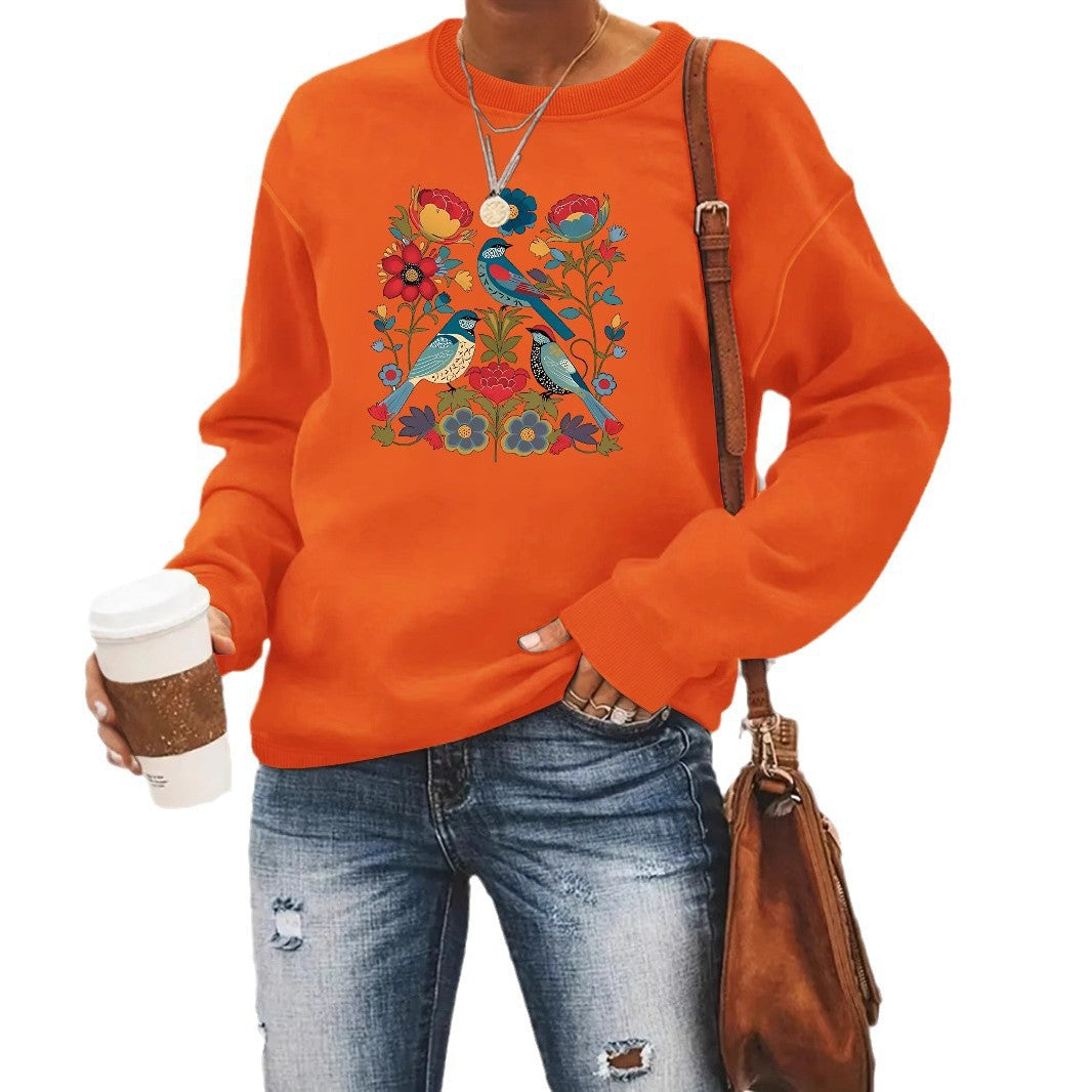 Damegenser med blomsterfuglmotiv og casual snitt Skjora