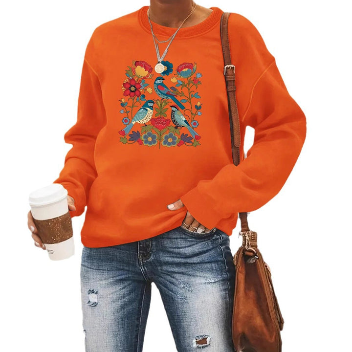 Damegenser med blomsterfuglmotiv og casual snitt Skjora