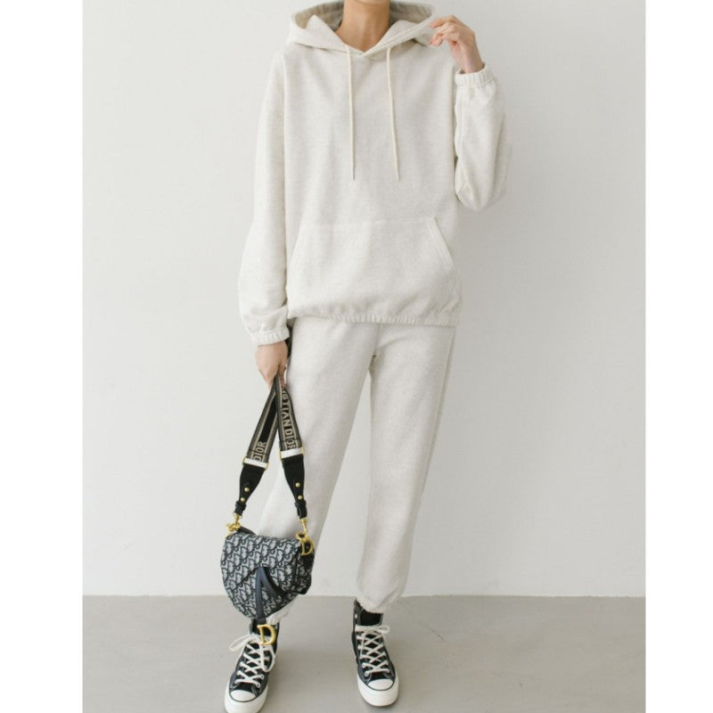 Kvinne Casual Hoodie og Joggebukse Sett med Elastisk Liv og Praktiske Lommer Skjora