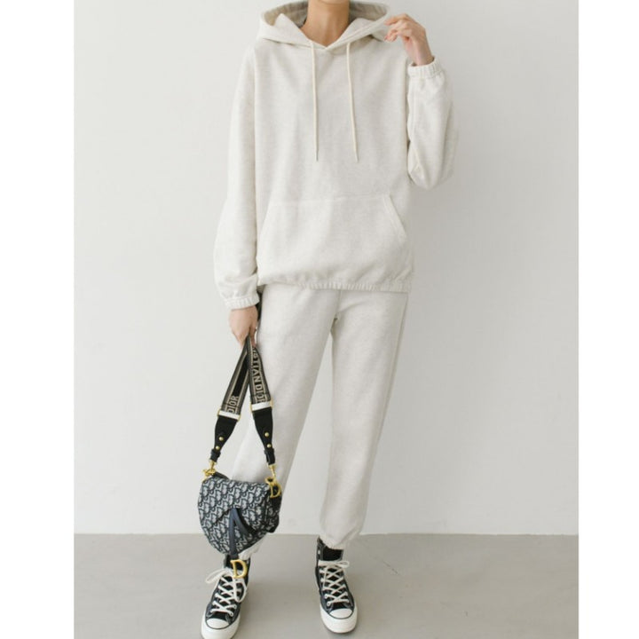 Kvinne Casual Hoodie og Joggebukse Sett med Elastisk Liv og Praktiske Lommer Skjora