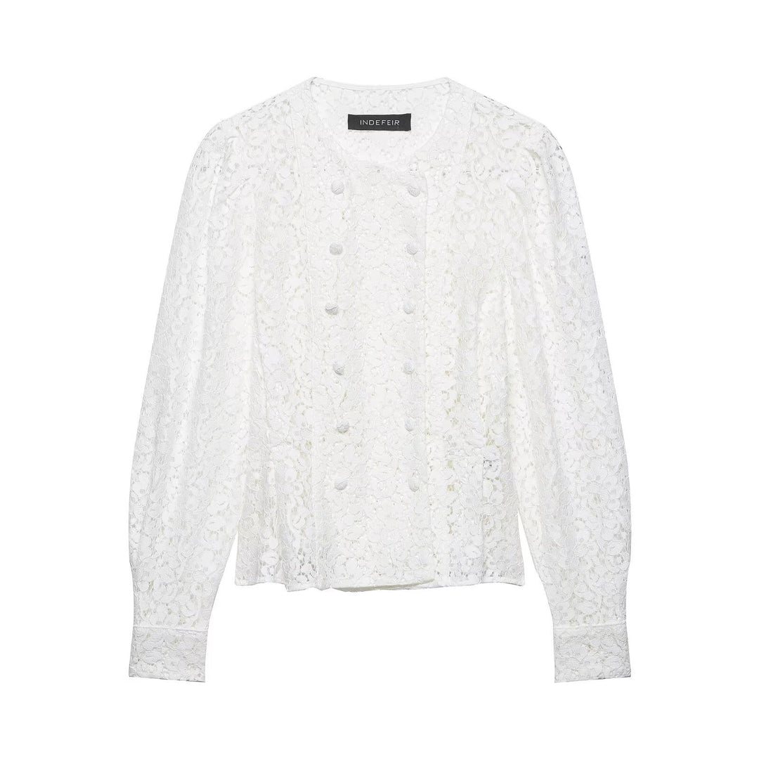 Dame spissbluse med dekorative knapper og elegant passform Skjora