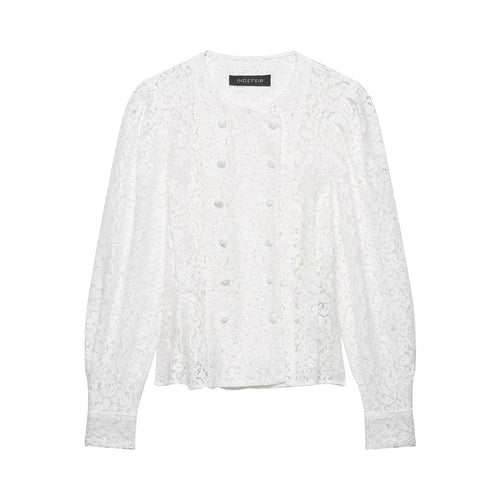 Dame spissbluse med dekorative knapper og elegant passform Skjora