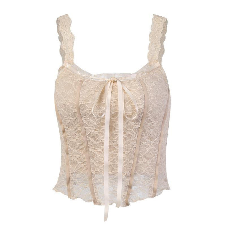 Dame spiss-crop-top med dekorative bånd og fine detaljer Skjora