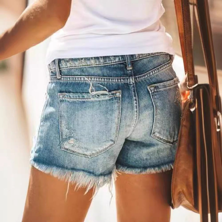 Dame trendy Ødelagte Denim-Shorts med frynsete kanter og stilige rifte detaljer Skjora