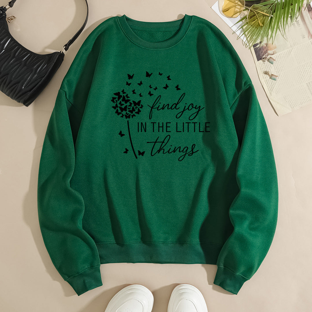 Kvinnegenser med motiverende slogan og blomsterprint Skjora