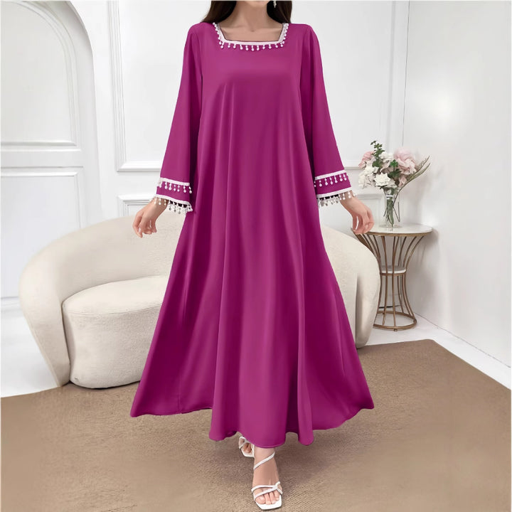 Kvinne Elegant Maxi Kjole med Dekorative Frynser og Brede Ermer Skjora