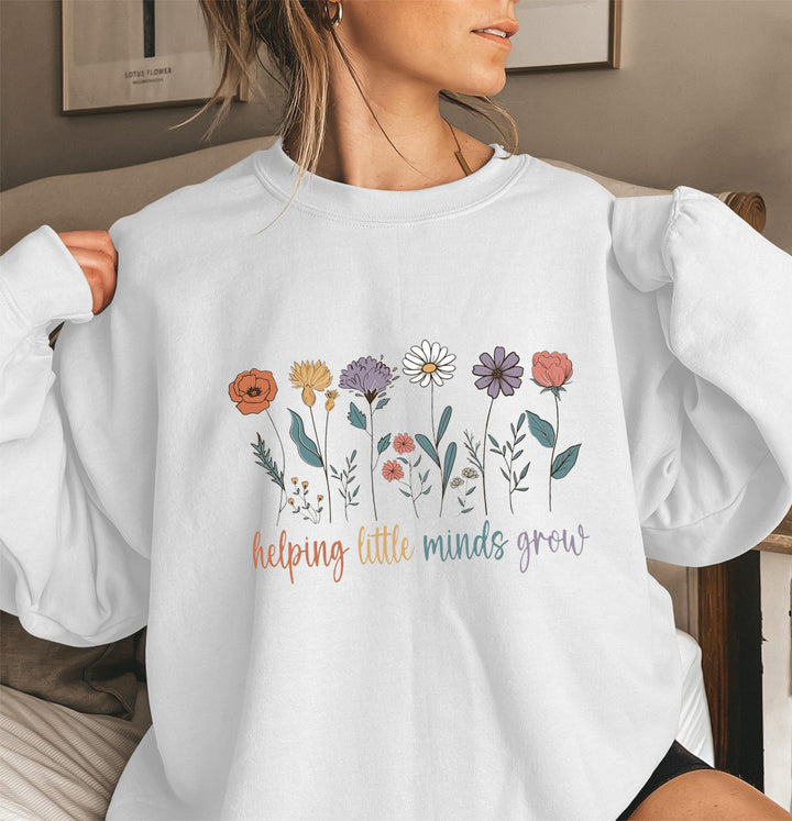 Kvinnesweatshirt med voluminøse ermer og motiverende blomstertrykk Skjora