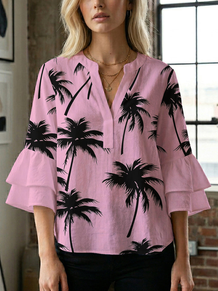 Dame bluse med voluminøse rysjermer og moderne motiv Skjora