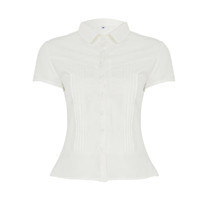 Damebluse med innsvingt snitt og dekorative folder Skjora