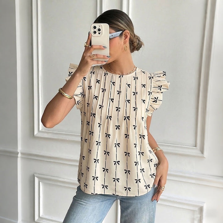 Damer bluse med rysjer, blomstertrykk og luftig snitt Skjora