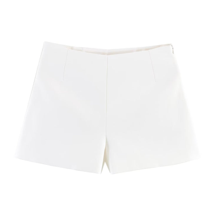 Damekombinasjon av kort topp og shorts Skjora