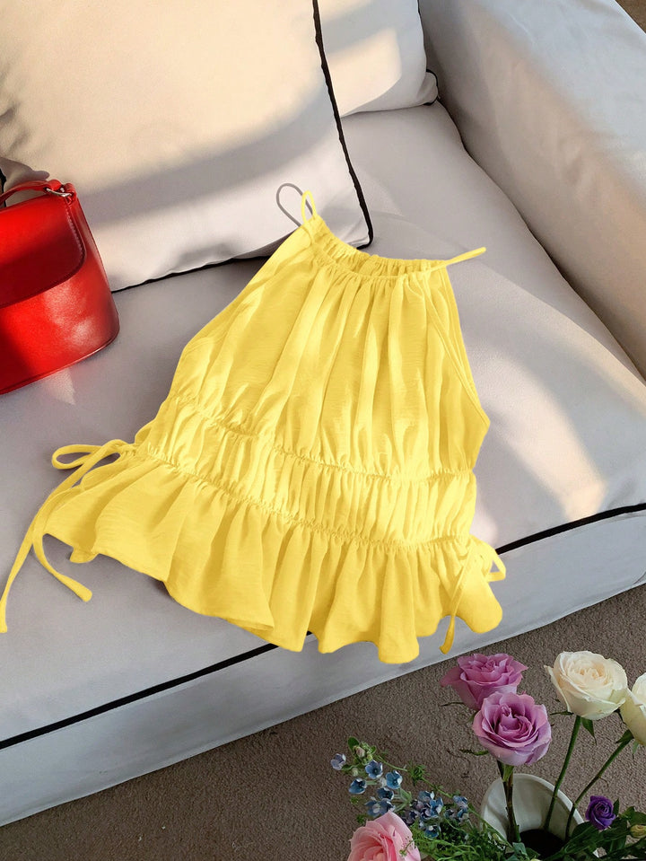 Dame avslappet bluse med volanger, justerbare stropper og elastisk belte Skjora