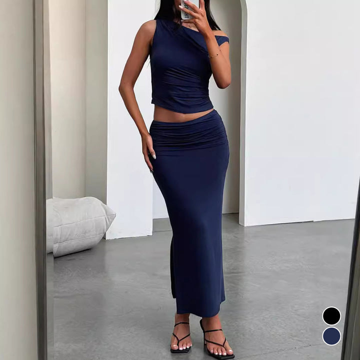 Dame sett fra off-shoulder topp og maxi-skjørt i rynket design Skjora