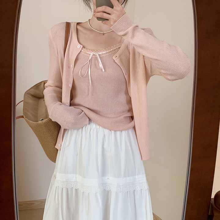 Kvinnelig uformell cardigan med fashionable knappedetaljer og forlengede ermer Skjora