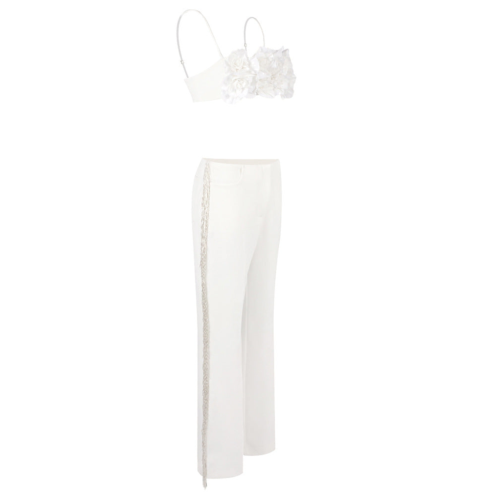 Damer elegant overdel med florale applikasjoner og smal buksedress Skjora