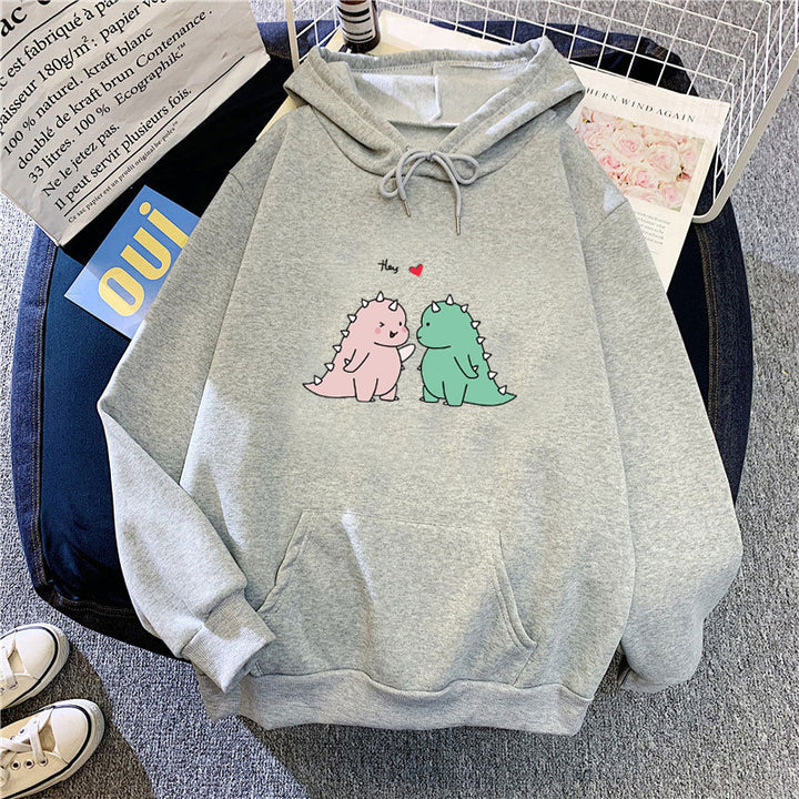 Damen Kapuzenpullover mit verspieltem Dinosaurier-Motiv Skjora