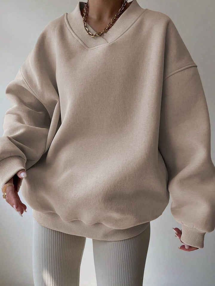 Damer Oversized Sweatshirt med V-hals og brede manchetter Skjora