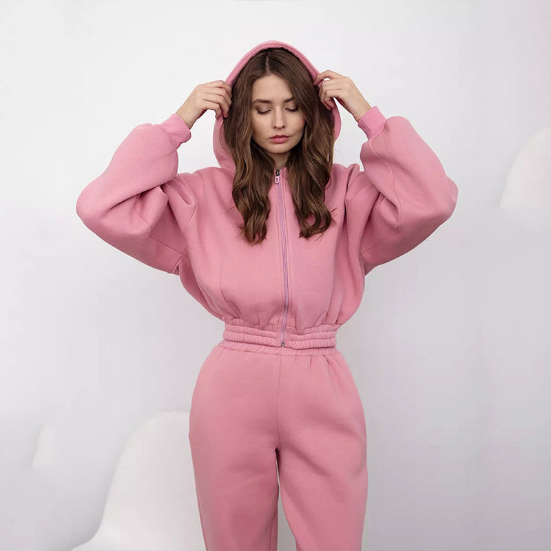 Kvinners sporty fleece jumpsuit med hette og løs passform Skjora