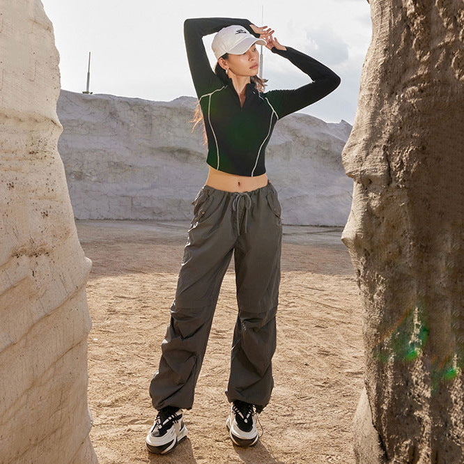 Women's Breathable Sports Top with High Collar and Thumbholes Skjora
