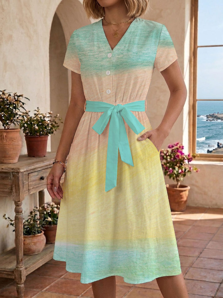 Damen Sommerliches Kleid mit taillierbarem Bindegürtel und floralem Muster Skjora