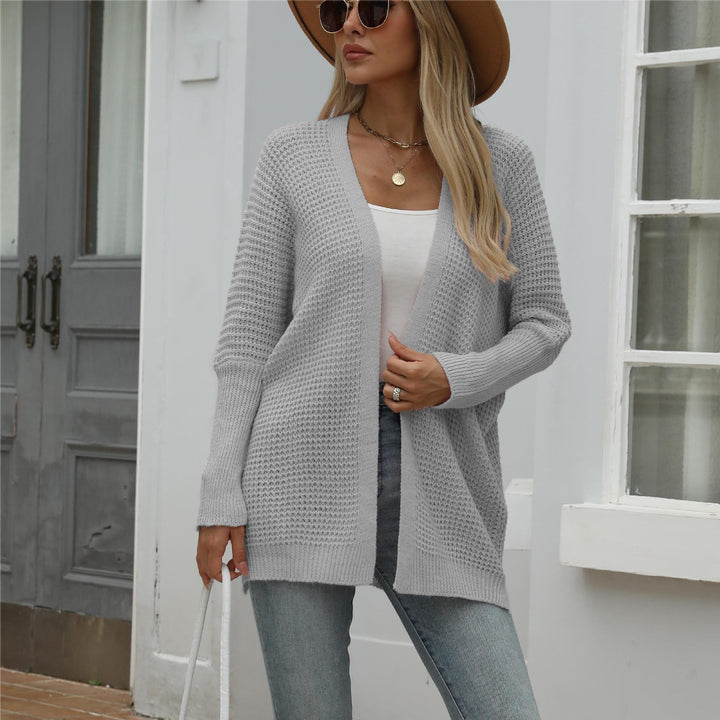 Kvinnens uformelle strikket cardigan med åpen front og grov tekstur Skjora