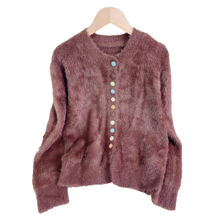Kvinnelig fluffy cardigan med fargerike knapper og vid-kuttet design Skjora