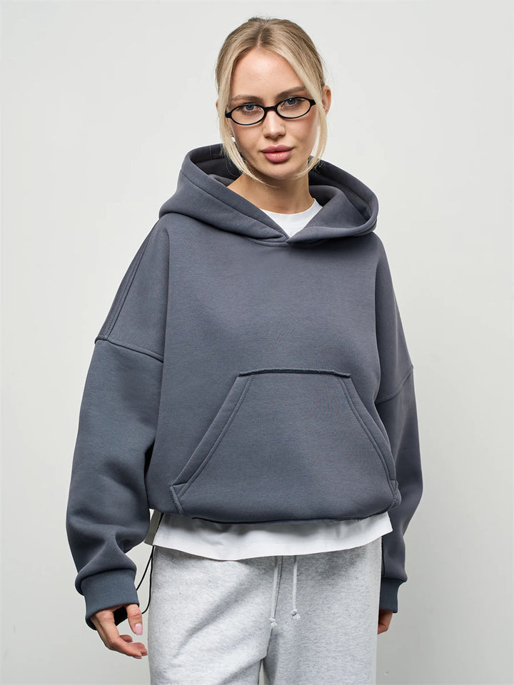 Dame oversized hettegenser med sidelommer og avslappet passform Skjora