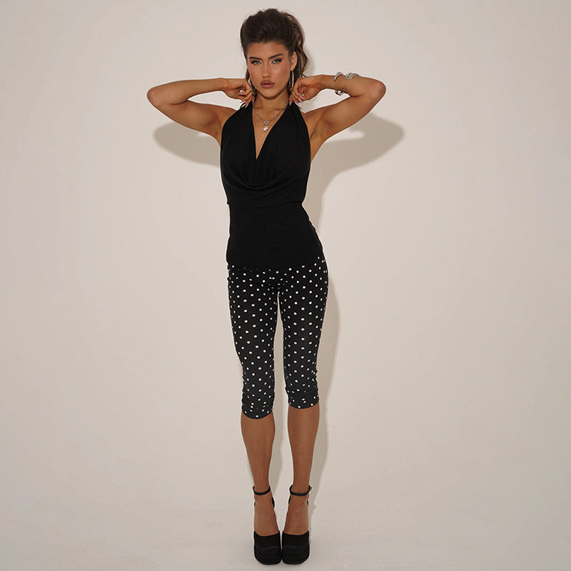 Dame figurtilpasset jumpsuit i prikket design Skjora