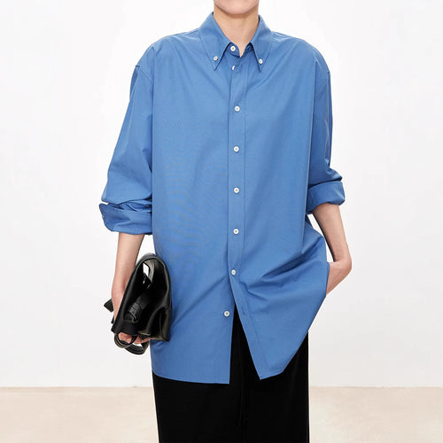 Damer elegant oversized bluse med klassiske knappedetaljer Skjora
