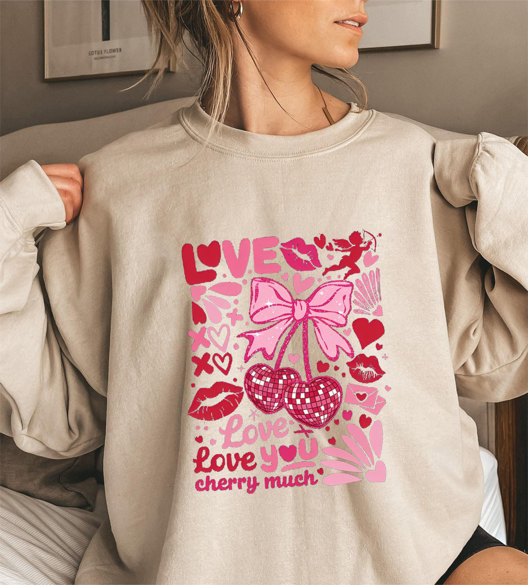 Dame sweatshirt med voluminøse ermer og lekent kirsebærmotif Skjora