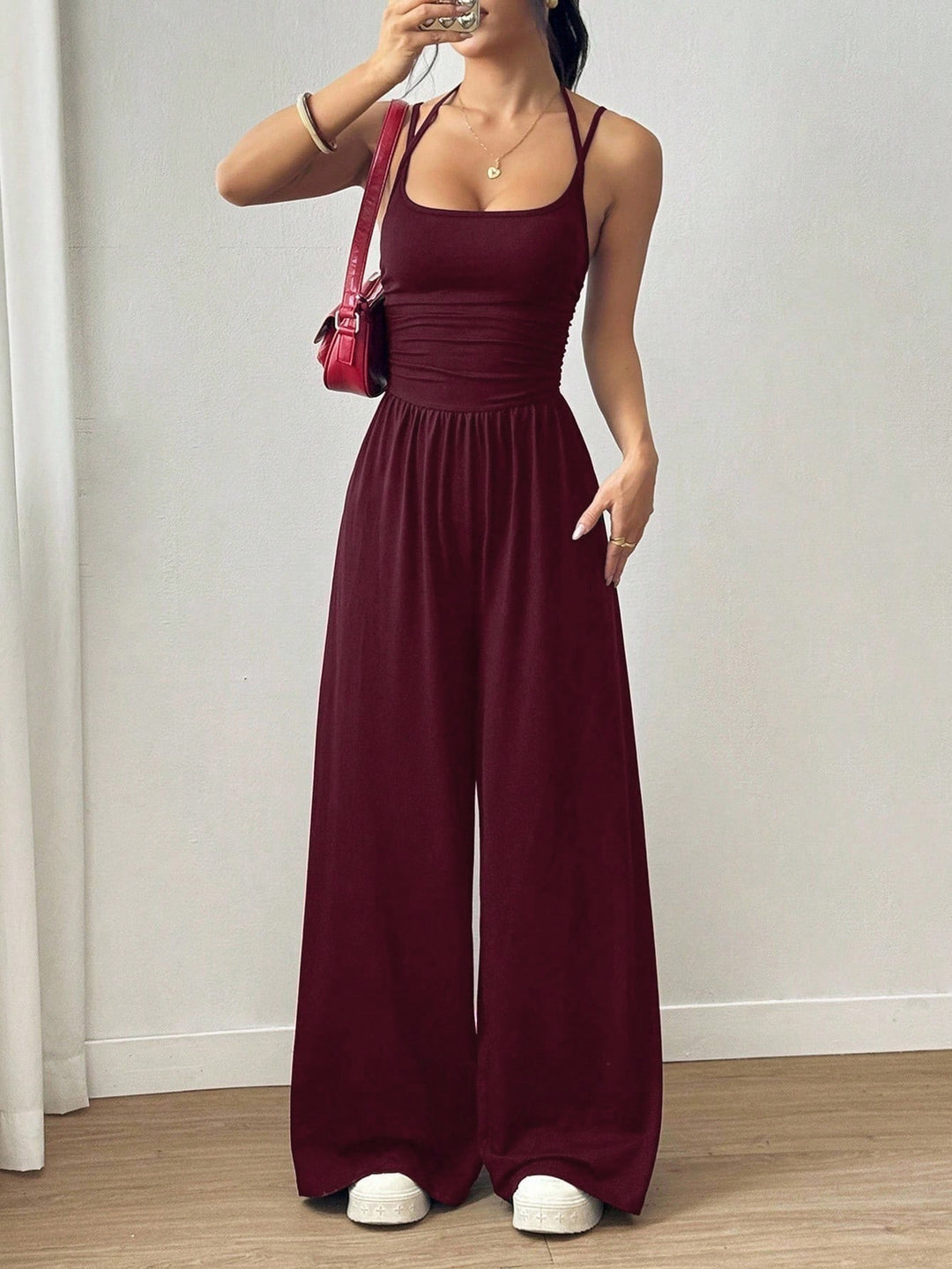 Dame luftig jumpsuit med høy midje og justerbare stropper Skjora