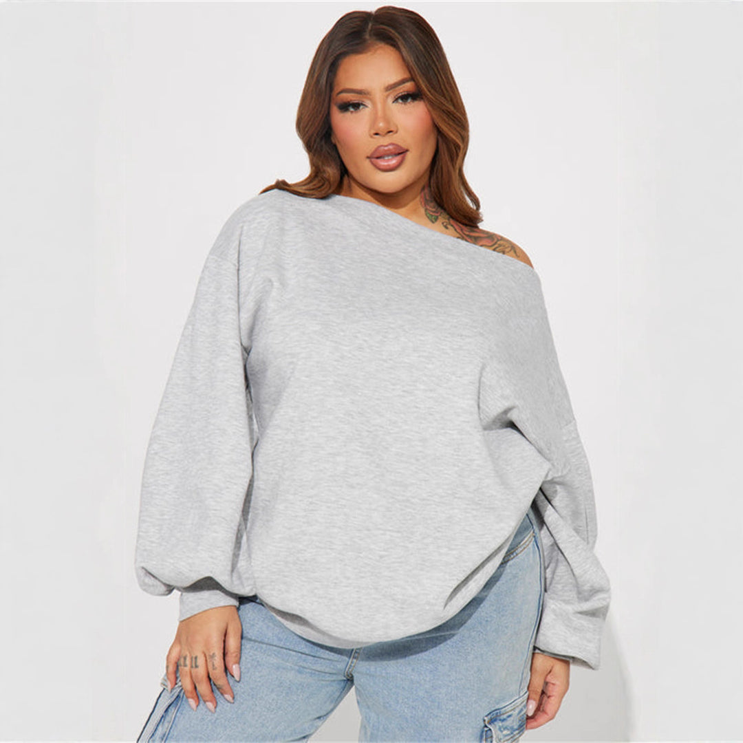 Kvinners oversized sweatshirt med asymmetrisk utringning og ballongformede ermer